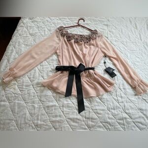 ￼ Long-sleeved, blouse, size large.